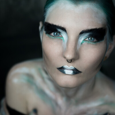 Dive into the world of avant-garde beauty with Lexa Throk, as she embodies the fierce elegance of an abstract falcon lady. Makeup by Anett Alexandra Bulano. π¨β¨ #AbstractBeauty #TurquoiseElegance #FalconLady Portrait of model Lexa Throk showcasing experimental turquoise green and white makeup, evoking the spirit of an abstract falcon lady.