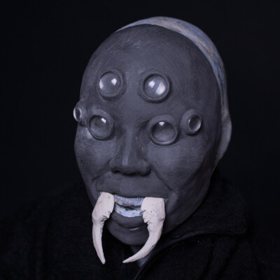 Delve into the creative journey behind Anett Alexandra Bulano's Tsuchigumo mask sculpture as it takes form, revealing the intricate details and craftsmanship behind the legendary Japanese spirit. π·οΈπ¨ #SculptureInProgress #SFXArt #TsuchigumoMask Work in progress photo of a Tsuchigumo mask sculpture made from SFX clay, featuring glass eyes and spider fangs.
